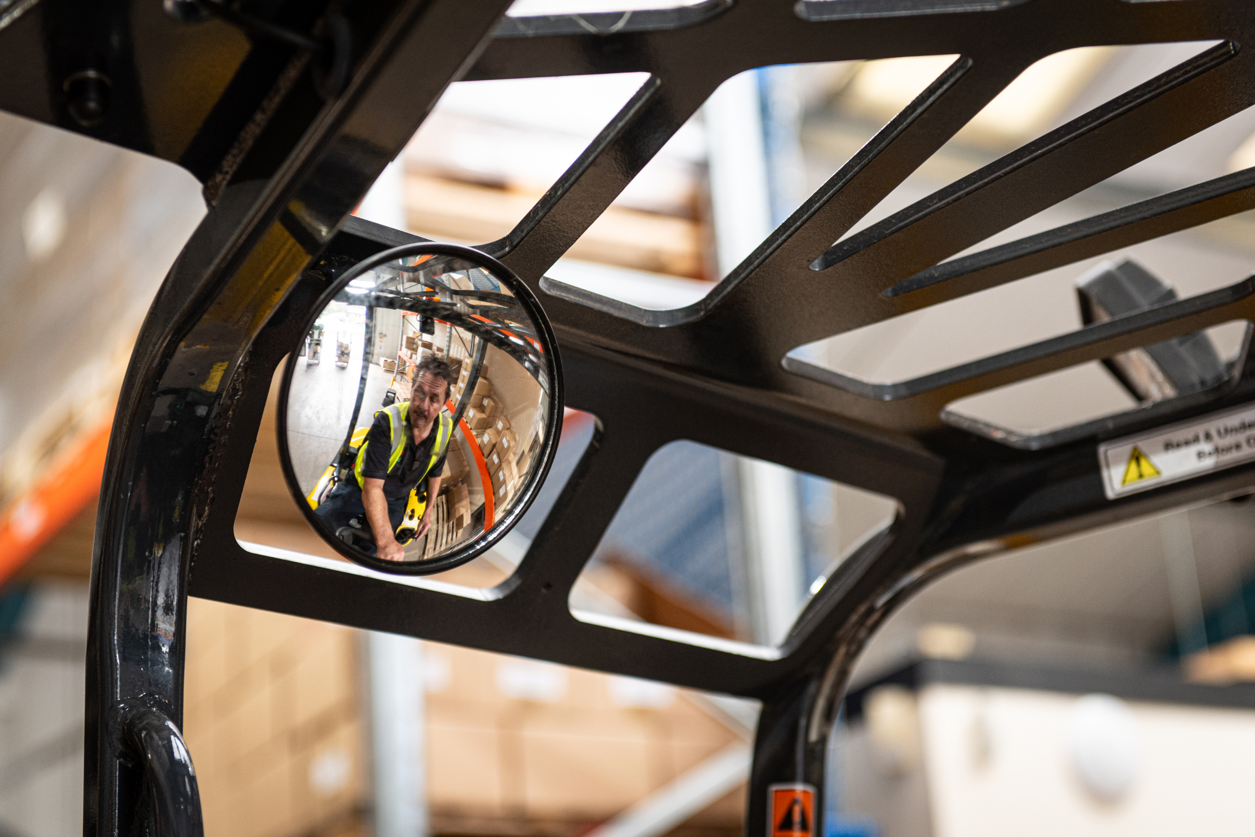 Worker on a forklift for ecommerce fulfiment